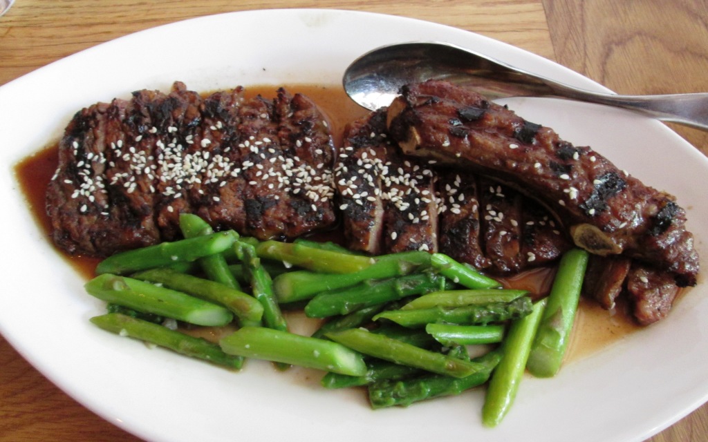 the Grilled, Marinated Creekstone Prime Rib Steak with Asparagus (at Red Farm)