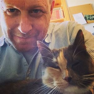 Andy Ricker with one of his cats (photo by Andy Ricker)
