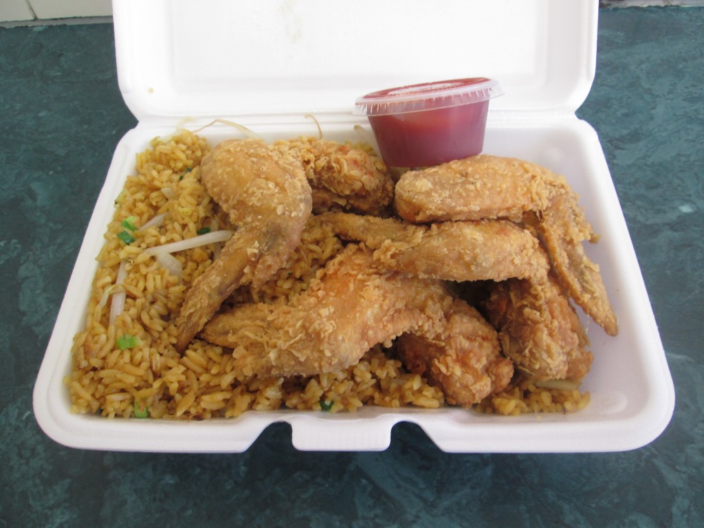 the fried chicken wings with fried rice (and mumbo sauce on the side) at Yum's II 