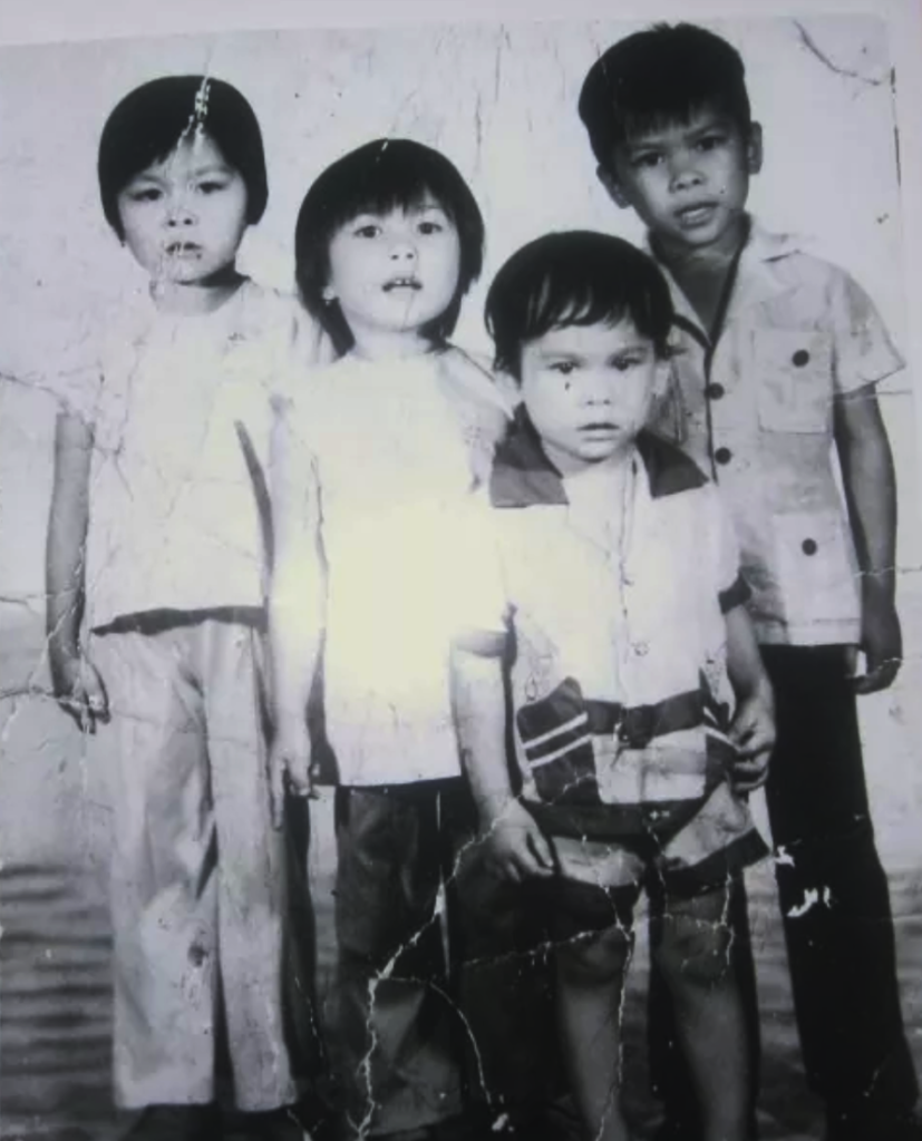 Seng Luangrath (left) in Laos as a young girl with her siblings 